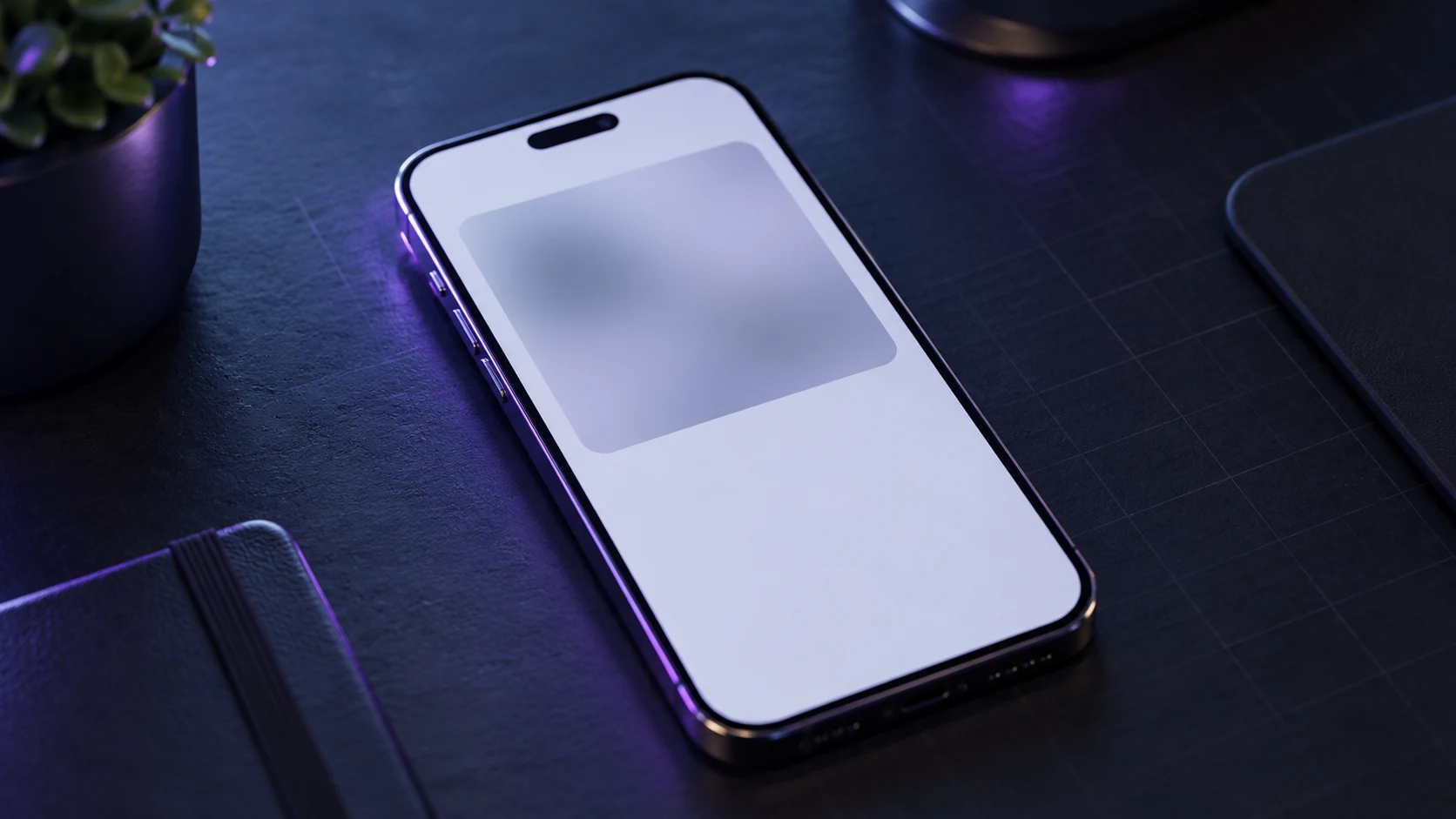 A smartphone on a dark desk showing a blurred grey image placeholder where the main photo has not loaded yet